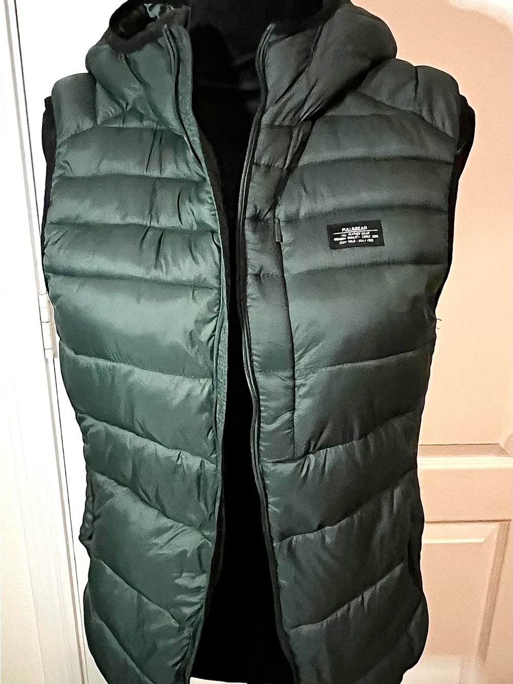 dark green Pull&Bear hooded puffer vest